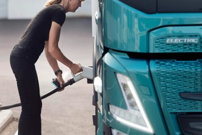 A shot of someone charging an electric truck