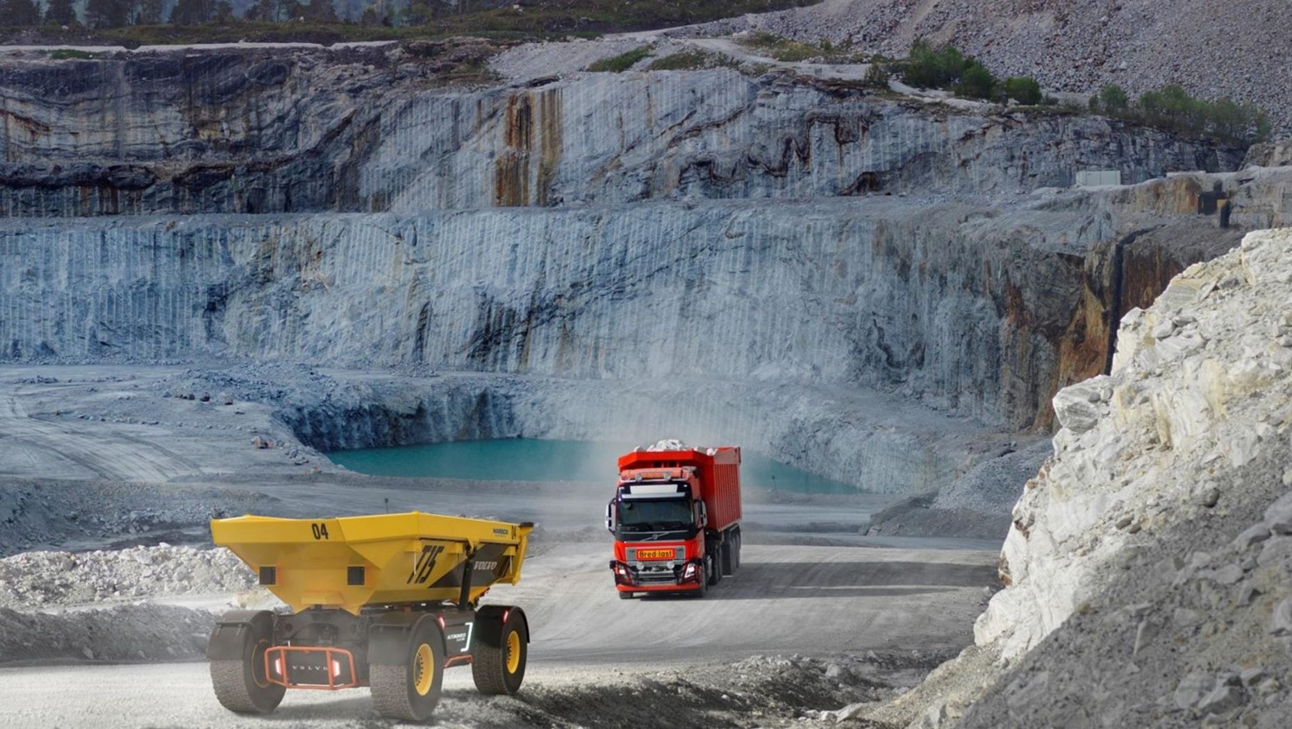 A truck and autonomous vehicle on a construction site