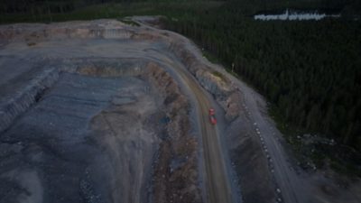 A single Volvo Autonomous truck driving in a quarry