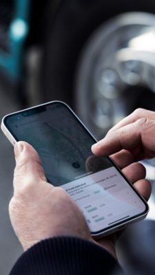 Man holding smartphone in hand