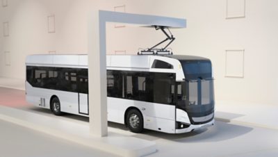 A Volvo BZL Electric single-decker, charging under an OppCharge pantograph.