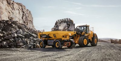 Volvo TA15 and a excavator working in a quarry