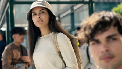 Passengers waiting at a bus stop
