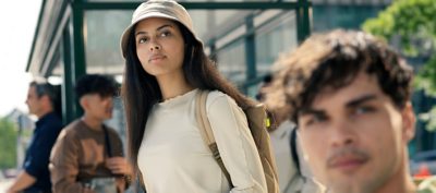Passengers waiting at a bus stop
