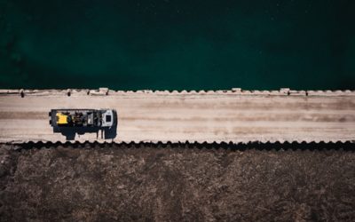 Volvo FMX on gravel road from above