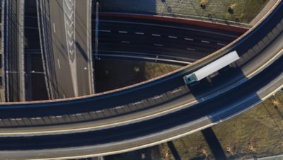 Volvo FH Electric on road from above
