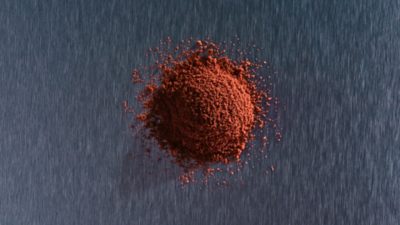 A red pile of recycled material