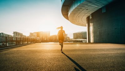 Woman running in the city