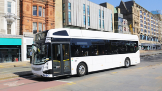A Volvo BZL Electric driving down a street
