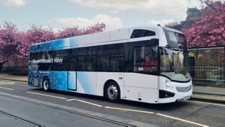 A Volvo BZL Electric driving down a street