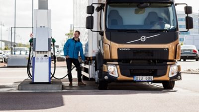 Volvo trucks servicing gas station truck