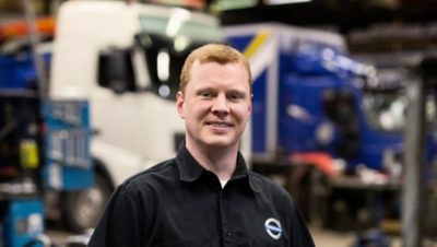 Volvo trucks services servicing planning man black shirt