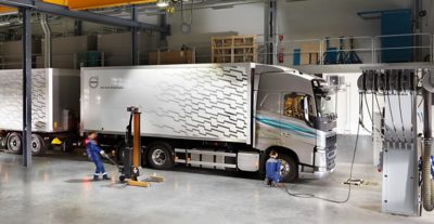 Truck with trailer in workshop
