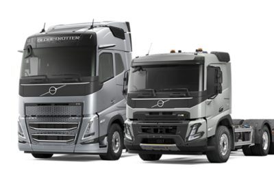Illustrazione di camion diesel Volvo FH e Volvo FMX affiancati su uno sfondo pulito.