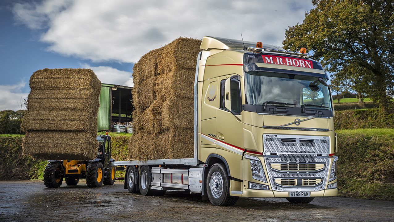 M.R. Horn makes hay and shines with a new gold liveried Volvo FH drawbar combination