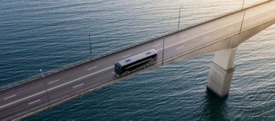 A Volvo 9700 DD driving on a bridge