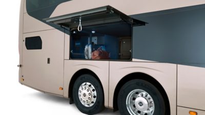The opened luggage compartment of a Volvo 9700 Double Decker 