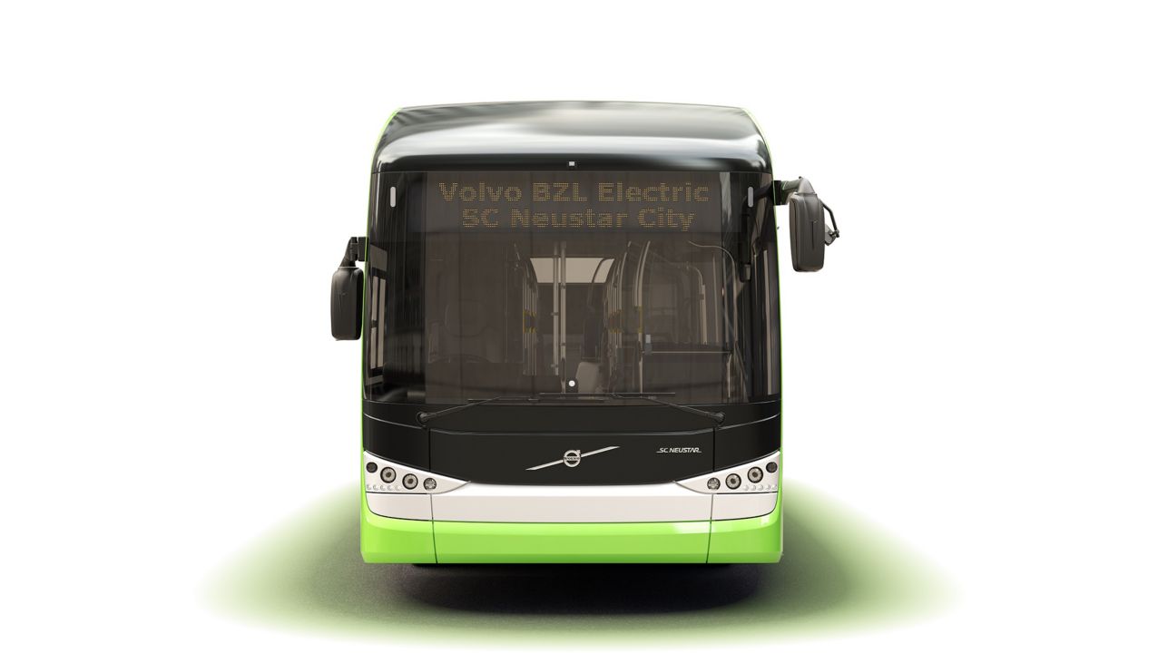 An image showing the darkened front of the SC Neustar City bus with the headlights fully lit.