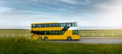 A Volvo B8L DD – MCV Evoseti driving on a country road on a summer day