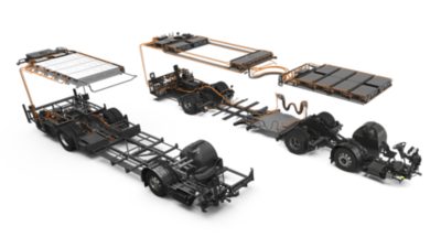 Studio image of a Volvo BZL Electric RHD chassis and a Volvo BZL Electric Articulated RHD chassis