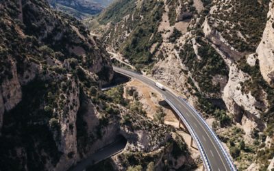 Driving on road through valley