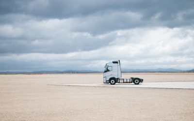 Volvo Fh Aero gas-powered parked at airport, viewed from the side