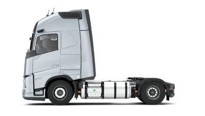 Side view of a Volvo FH Aero gas-powered truck chassis on a clean white background.