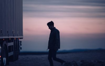 Person walking towards a truck