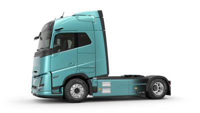 Tahač Volvo FH Electric v tyrkysové barvě zachycený v bočním profilu na bílém ateliérovém pozadí.