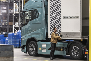 Volvo FH Electric truck - delivering goods in a warehouse
