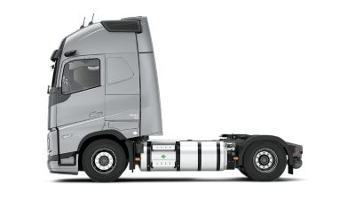 Side view of a Volvo FH gas-powered truck chassis on a clean white background.