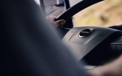 Hands on a steering wheel