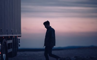 Person walking towards a truck