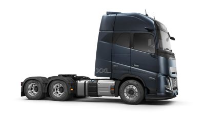 Studio side view of a Volvo FH16 Aero truck with XXL cab on a clean white background.