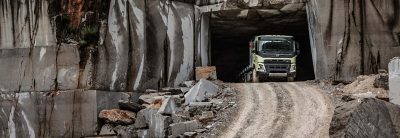 Volvo FMX driving on a gravel road