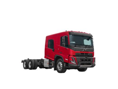 Studio front-side view of a red Volvo FMX.