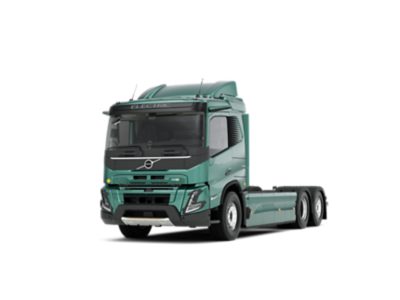 Volvo FMX Electric truck shown in a clean studio setting from a front three‑quarter angle.
