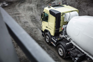 A Volvo FMX concrete mixer on site.