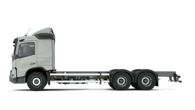 Side view of a Volvo FMX truck chassis on a clean white background.