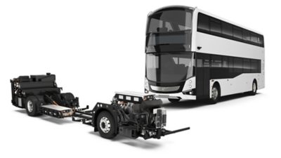 Studio image of an electric double-decker bus chassis and a complete bus