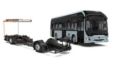 Studio image of a low-floor electric bus chassis and complete bus