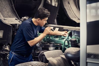 volvo-mechanic-working-on-truck.jpg