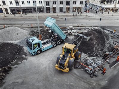 Technicians walking beside truck