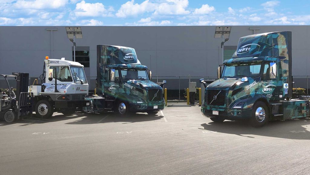 Volvo Trucks customer NFI achieves a major electrification milestone at its Chino, California location including adding two Volvo VNR Electrics to its fleet along with utilizing electric yard trucks and forklifts
