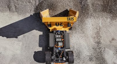  Volvo TA15 electric dumper unloads crushed stone in a stone pile